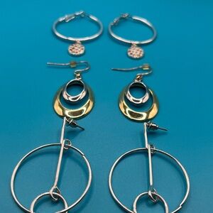 Chic Earring Collection: Silver Hoops, Abstract Dangles, & Two-Tone Ovals